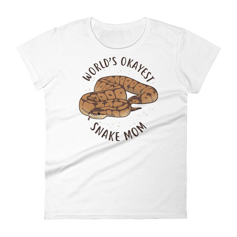 May include: White t-shirt with a brown snake illustration and the text "World's Okayest Snake Mom".