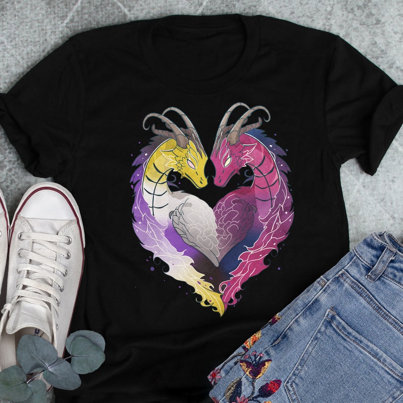 a pair of jeans and a t - shirt with a dragon heart on it