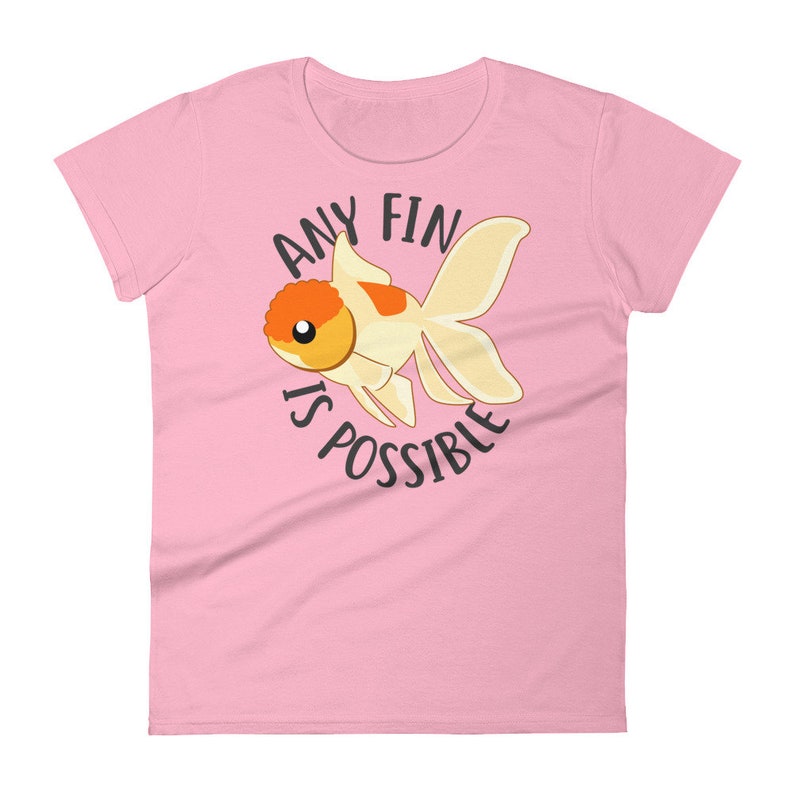 May include: Pink women's t-shirt with a cartoon goldfish and the text "Any fin is possible."