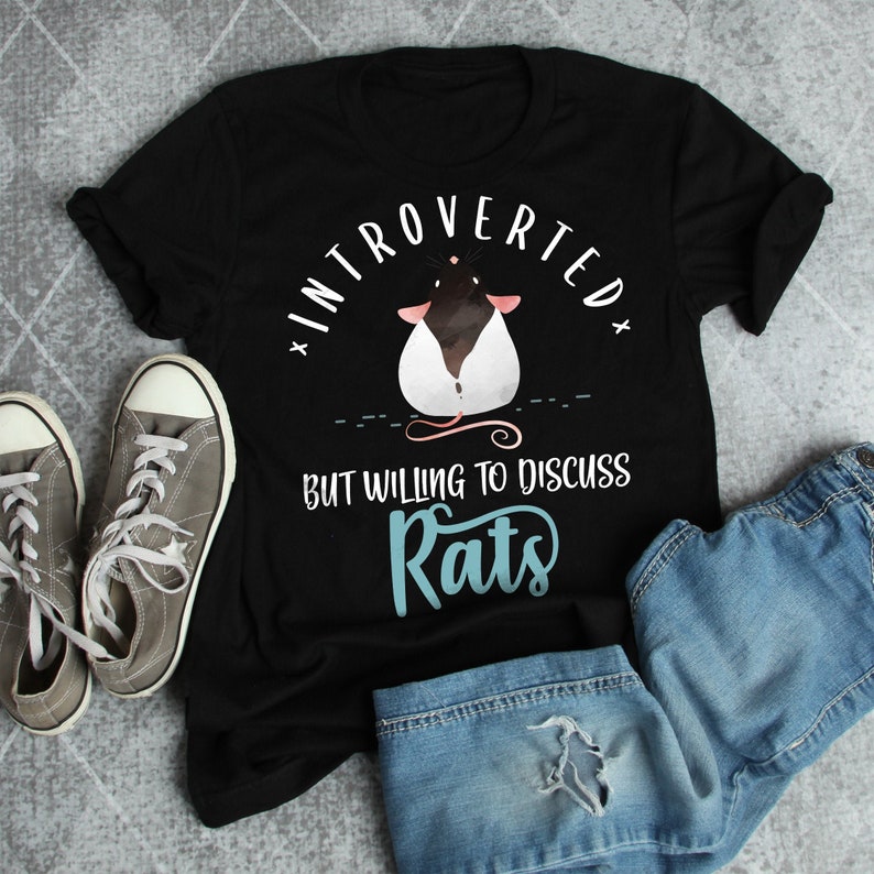 May include: Black t-shirt with a white rat illustration and the text "Introverted but willing to discuss Rats".