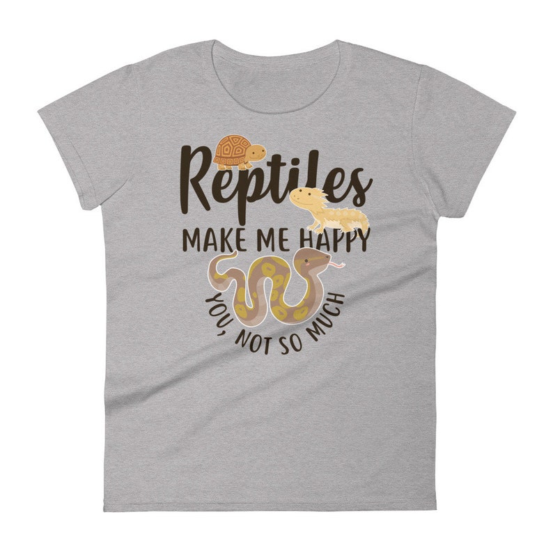 May include: Gray t-shirt with the text "Reptiles make me happy, you not so much" in brown lettering. The shirt features a cartoon turtle, lizard, and snake.