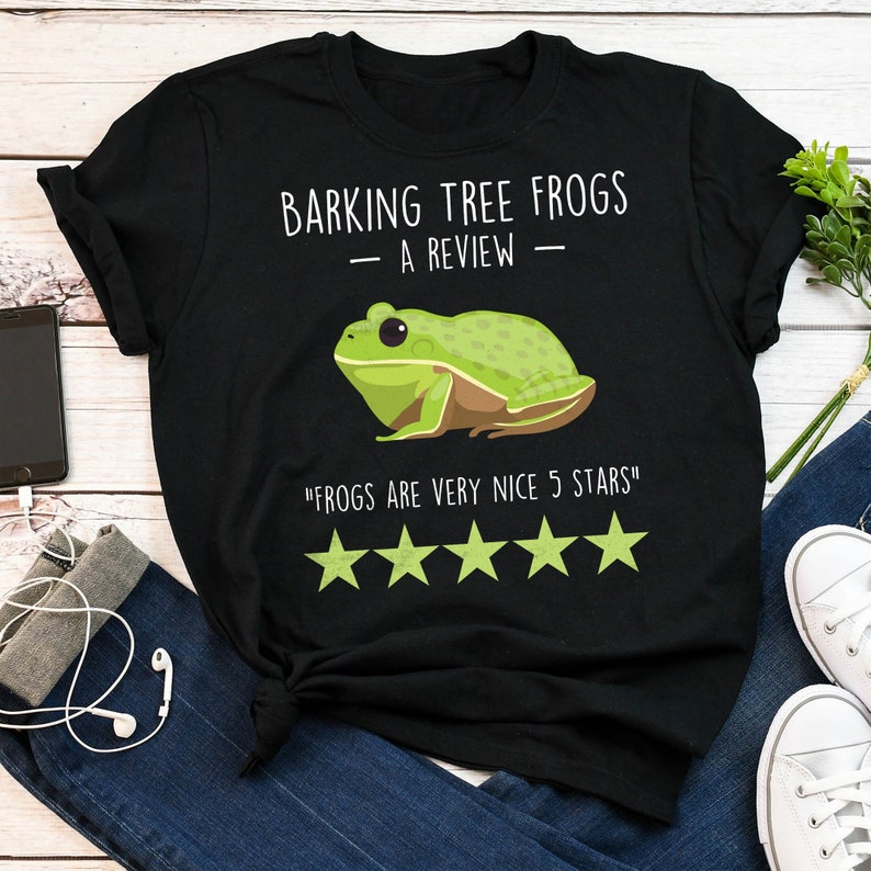 May include: Black t-shirt with a green tree frog illustration and the text "Barking Tree Frogs - A Review - "Frogs are very nice 5 stars" with five gold stars.