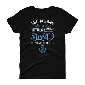 May include: Black t-shirt with a blue ribbon and the text "SHE BELIEVED *she could* BUT SHE WAS REALLY Tired >> SO SHE DIDN'T&rarr; CHRONIC FATIGUE SYNDROME"