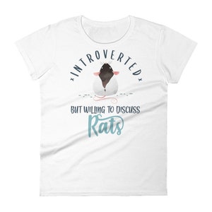 May include: White t-shirt with a black and white cartoon rat and the text "Introverted but willing to discuss Rats".