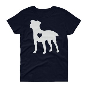 May include: A navy blue women's t-shirt featuring a white silhouette of a dog with a heart in its chest.