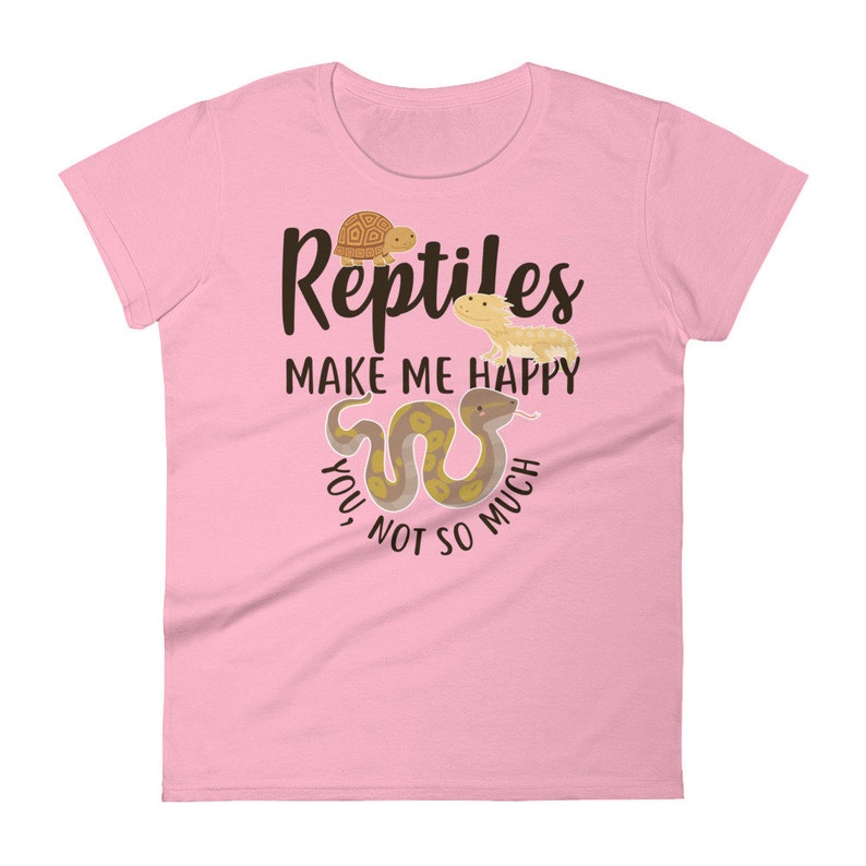 May include: Pink women's t-shirt with a brown snake, a turtle, and a lizard. The text on the shirt reads "Reptiles Make Me Happy You Not So Much."