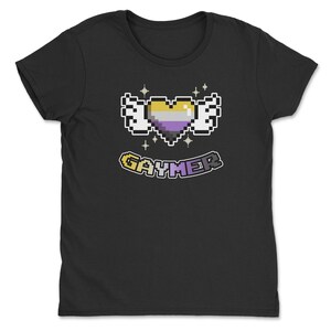 a black t - shirt with a pixel heart in the middle