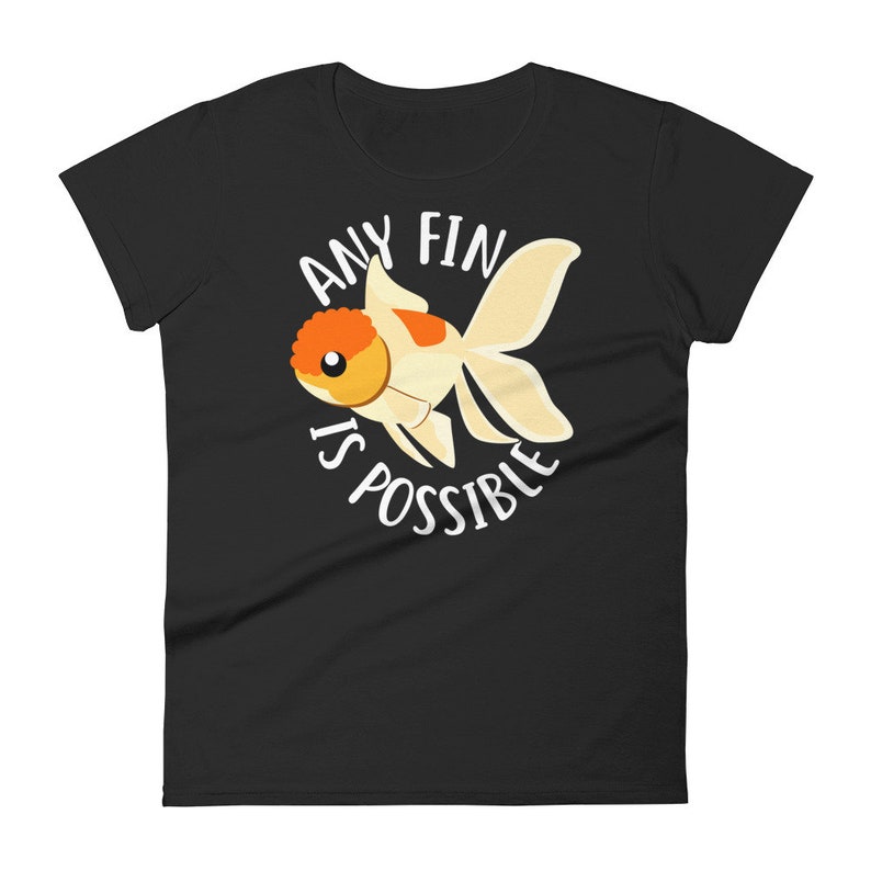 May include: Black women's t-shirt with a white goldfish illustration and the text "Any Fin Is Possible".