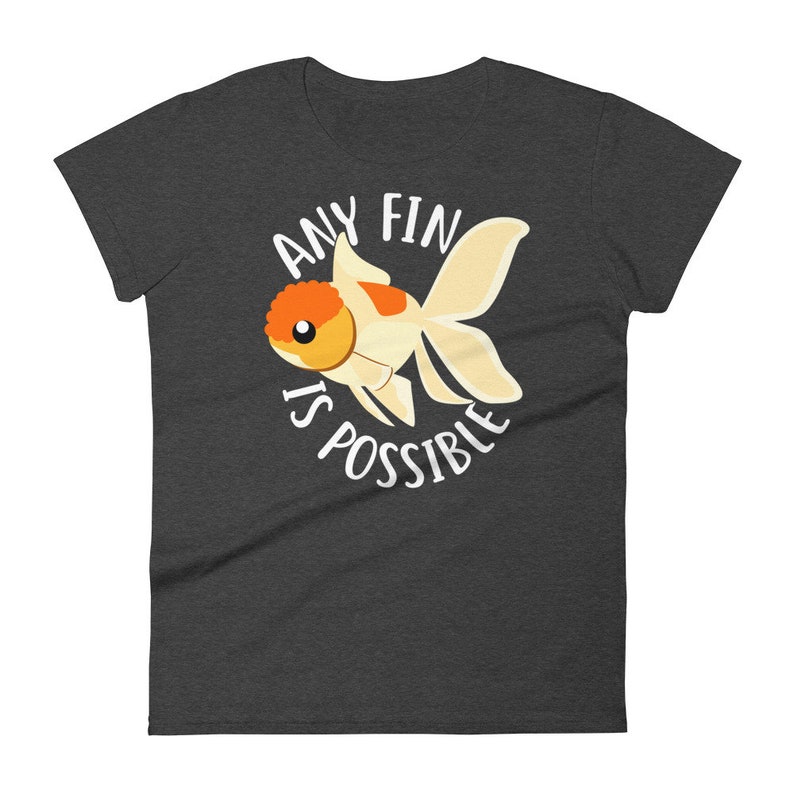 May include: A dark heather grey t-shirt with a white graphic of a goldfish and the text "Any Fin Is Possible".