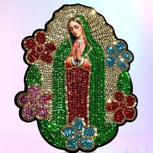 May include: A colorful, sequined patch depicting the Virgin Mary, surrounded by flowers. The patch is made of green, red, blue, and gold sequins.