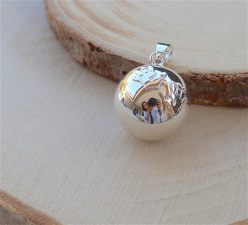 silver plated smooth hand cage pendant
