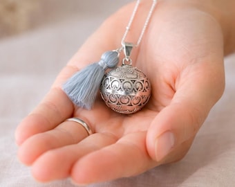 vintage silver pregnancy bola with tassel