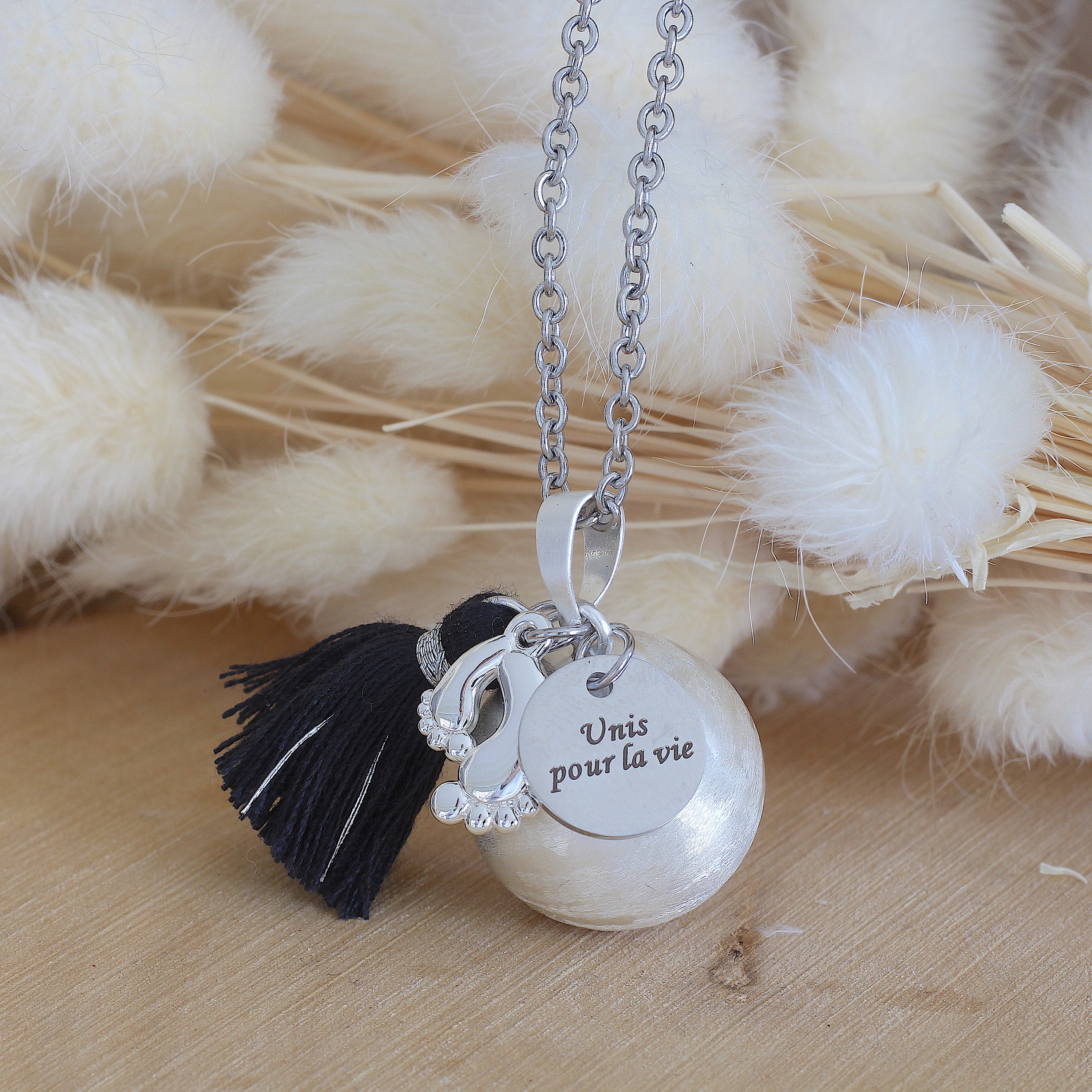 Bola of silver brushed pompom medal small feet