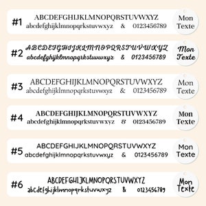 May include: Six white tags with different font styles displaying the alphabet, numbers, and the text "Mon Texte". Each tag has a unique font style for the uppercase and lowercase letters, and numbers.