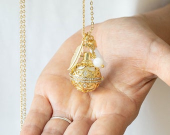 pregnancy bola cage rhinestone gold gift future mother pearl moonstone feather