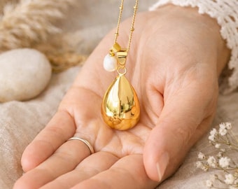 Gold teardrop pregnancy bola freshwater pearl pendant