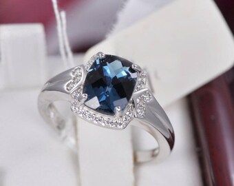 Anillo de plata de ley 925 auténtica con topacio azul natural de Londres. Talla 7.