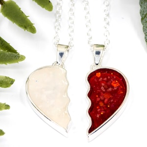 Two matching split heart pendants. Visit www.samfirememorials.co.uk if sending human ashes. For pet remains only.