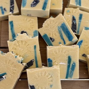 Vegan soap with charcoal and mica colored embeds