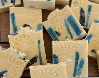 Vegan soap with charcoal and mica colored embeds