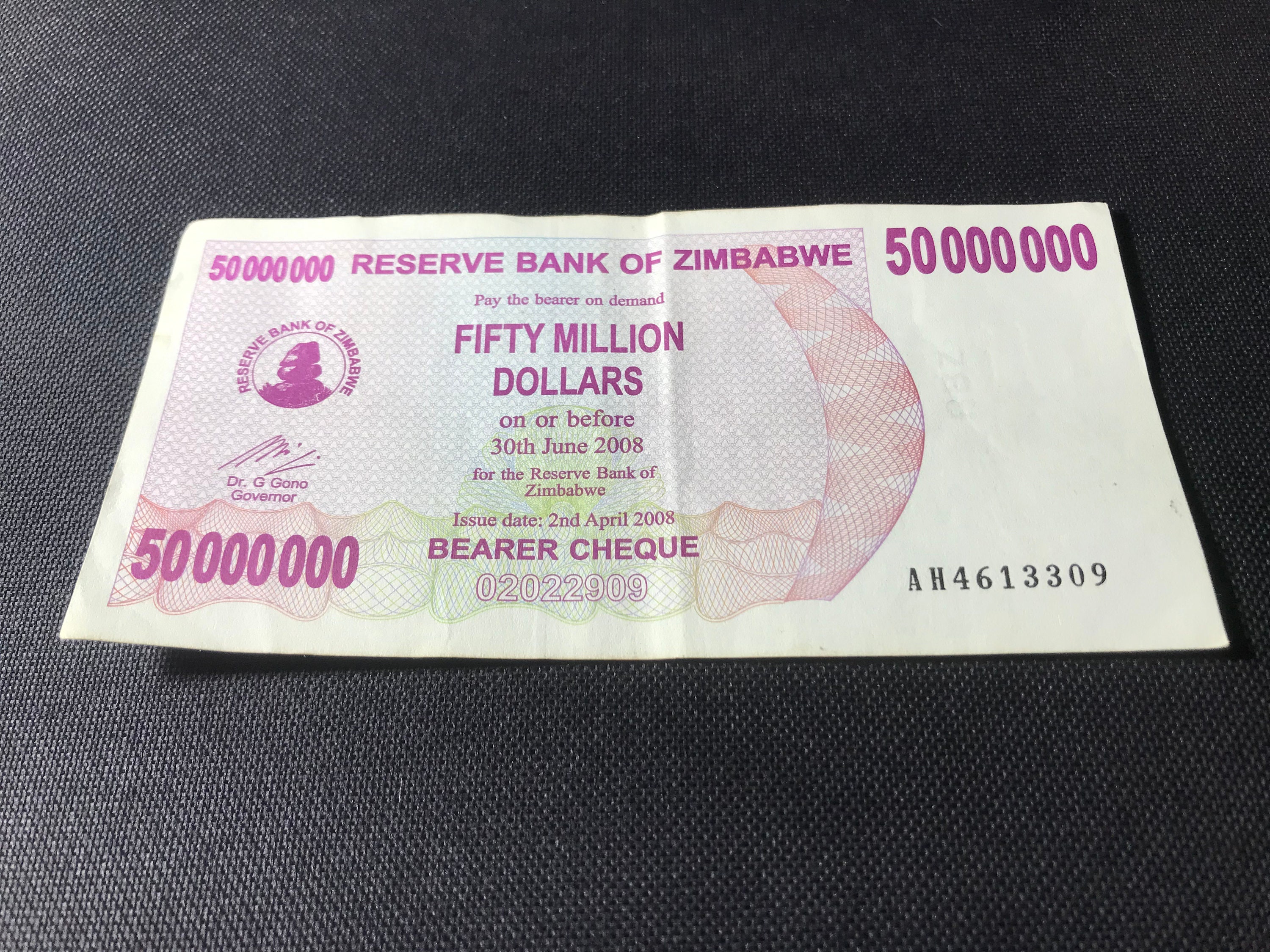 ヴィンテージジンバブエ5000万ドル紙幣：希少コレクターズノート