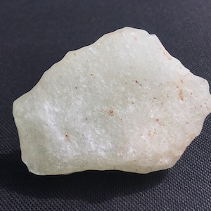 Libyan Desert Glass from Egypt - LDG - individual stone- rare white colored specimen - semi translucent - natural outside patina - 73.6 g