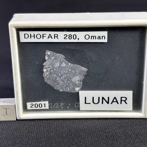 DHOFAR 280 - Lunar Meteorite - feldspathic breccia meteorite - discovered in Oman’s Dhofar region in 2001 - part slice - weight - 0.854 g