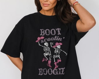 Trendy Halloween T-Shirt. Boot Scootin' Boogie Tee. Skeleton dancing Cowgirl Pink Distressed Graphic Tee Comfort Colors Oversized Fall Shirt