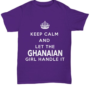May include: Purple t-shirt with a white crown and the text "Keep Calm and Let the Ghanaian Girl Handle It."