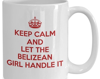 May include: White ceramic coffee mug with a red crown and the text "Keep Calm and Let the Belizean Girl Handle It" printed on it.