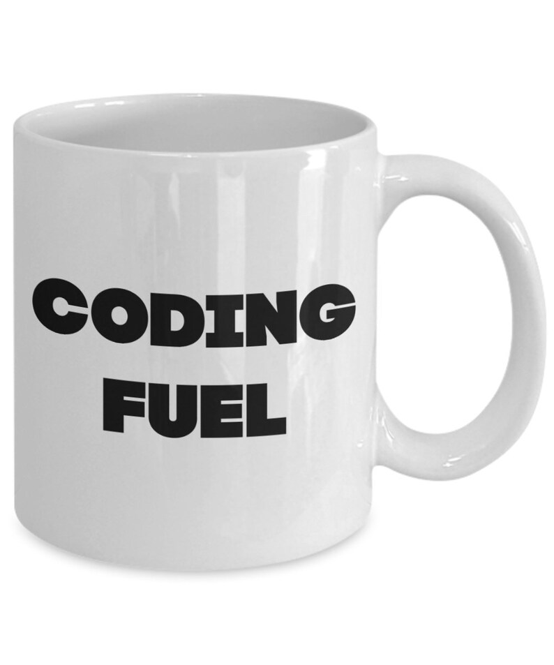 May include: White ceramic coffee mug with black text that reads "Coding Fuel".