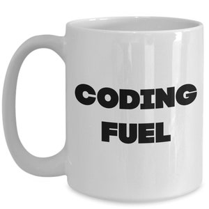 May include: White ceramic coffee mug with black text that reads "CODING FUEL".