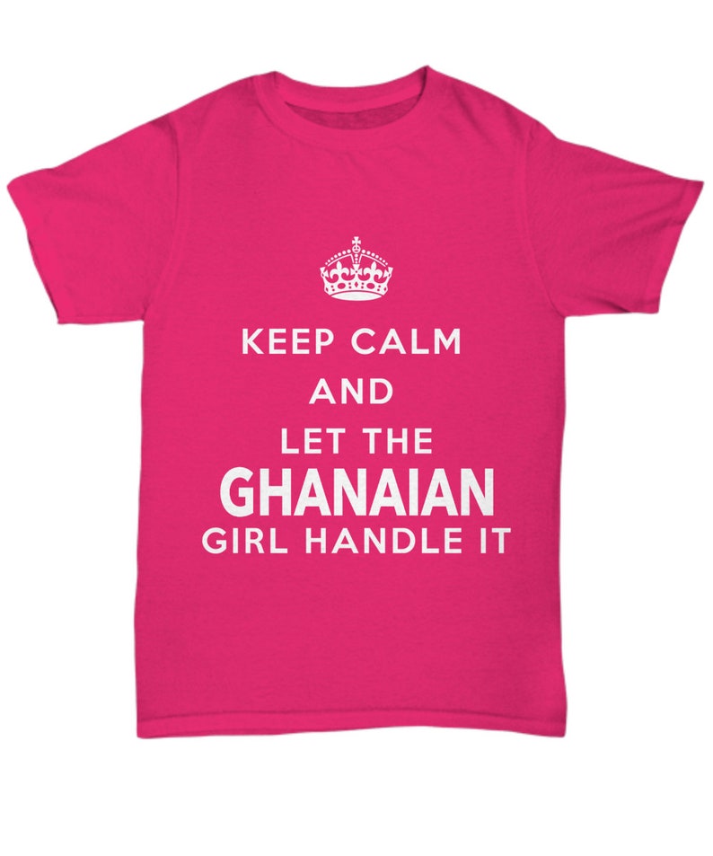 May include: A pink t-shirt with the text "Keep Calm and Let the Ghanaian Girl Handle It" in white. A crown graphic is above the text.