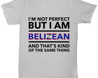 May include: A gray t-shirt with black text that reads "I'm not perfect but I am Belizean and that's kind of the same thing". The text is centered on the shirt and is surrounded by a black border. The Belizean flag is displayed in the center of the text.
