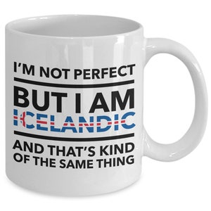 May include: White ceramic coffee mug with black text that reads "I'm not perfect but I am Icelandic and that's kind of the same thing". The text is framed by a black line. The word "Icelandic" is in blue and red, with a small Icelandic flag graphic.