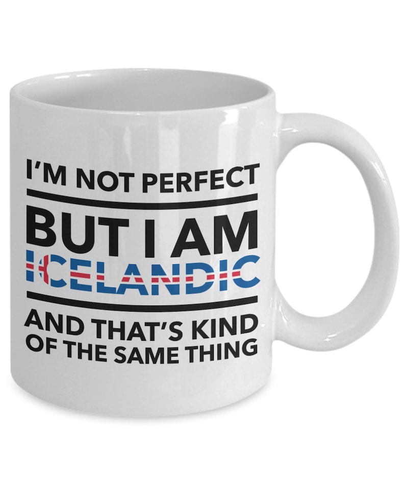 May include: White ceramic coffee mug with black text that reads "I'm not perfect but I am Icelandic and that's kind of the same thing". The text is framed by a black line. The word "Icelandic" is in blue and red, with a small Icelandic flag graphic.
