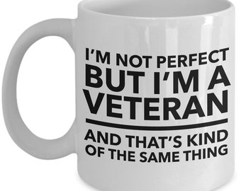 May include: White ceramic coffee mug with black text that reads "I'm not perfect but I'm a veteran and that's kind of the same thing."