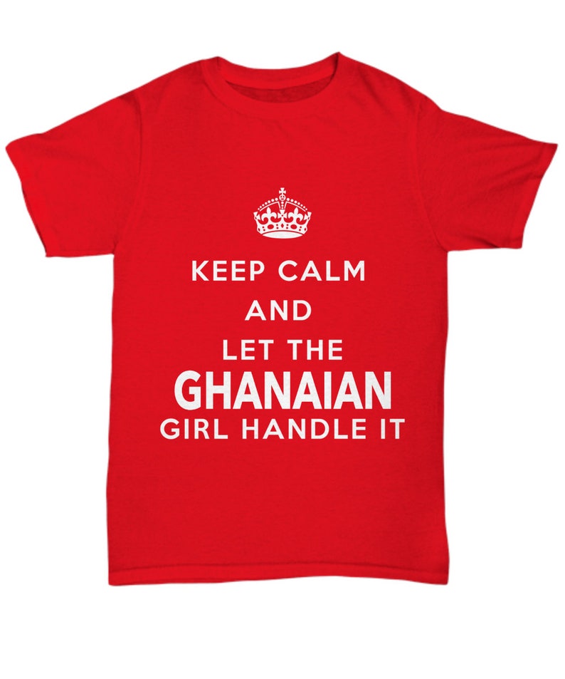 May include: Red t-shirt with white text that reads "Keep Calm and Let the Ghanaian Girl Handle It". A crown graphic is above the text.