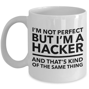 May include: White ceramic coffee mug with black text that reads "I'm not perfect but I'm a hacker and that's kind of the same thing."