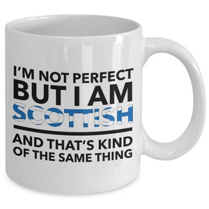 May include: White ceramic coffee mug with black text that reads "I'm not perfect but I am Scottish and that's kind of the same thing". The word "Scottish" is written in blue and white stripes, resembling the Scottish flag.