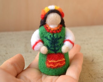 A doll in a folk costume belongs to the earth element, a unique amulet for your home, a toy or a gift
