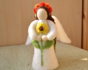Wool angel doll Felt angel with a sunflower and a wreath decorating the head