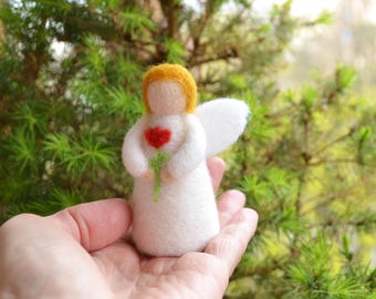 Wool angel doll with red flower