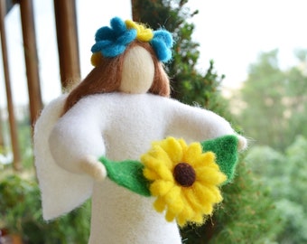 Wool angel doll Felt angel with a sunflower and a wreath decorating the head