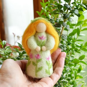 A doll in a green dress, a unique amulet for your home, a toy or a gift.