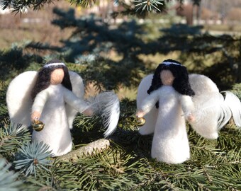 Angels with feathers and a bell