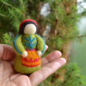A doll in a green dress, a unique amulet for your home, a toy or a gift.