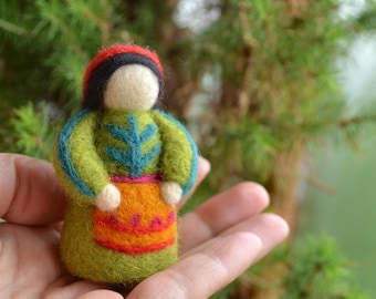 A doll in a green dress