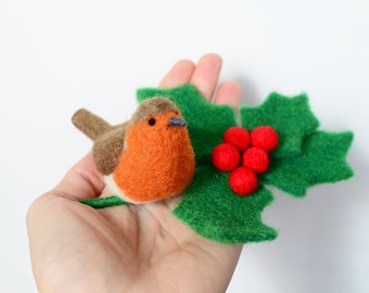 Robin bird with leaves and berries