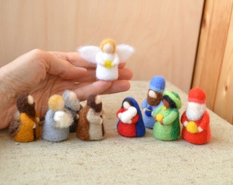 Nativity scene, felt figure of Mary and Joseph, figure of three kings, three shepherds, angel, Bible, felt